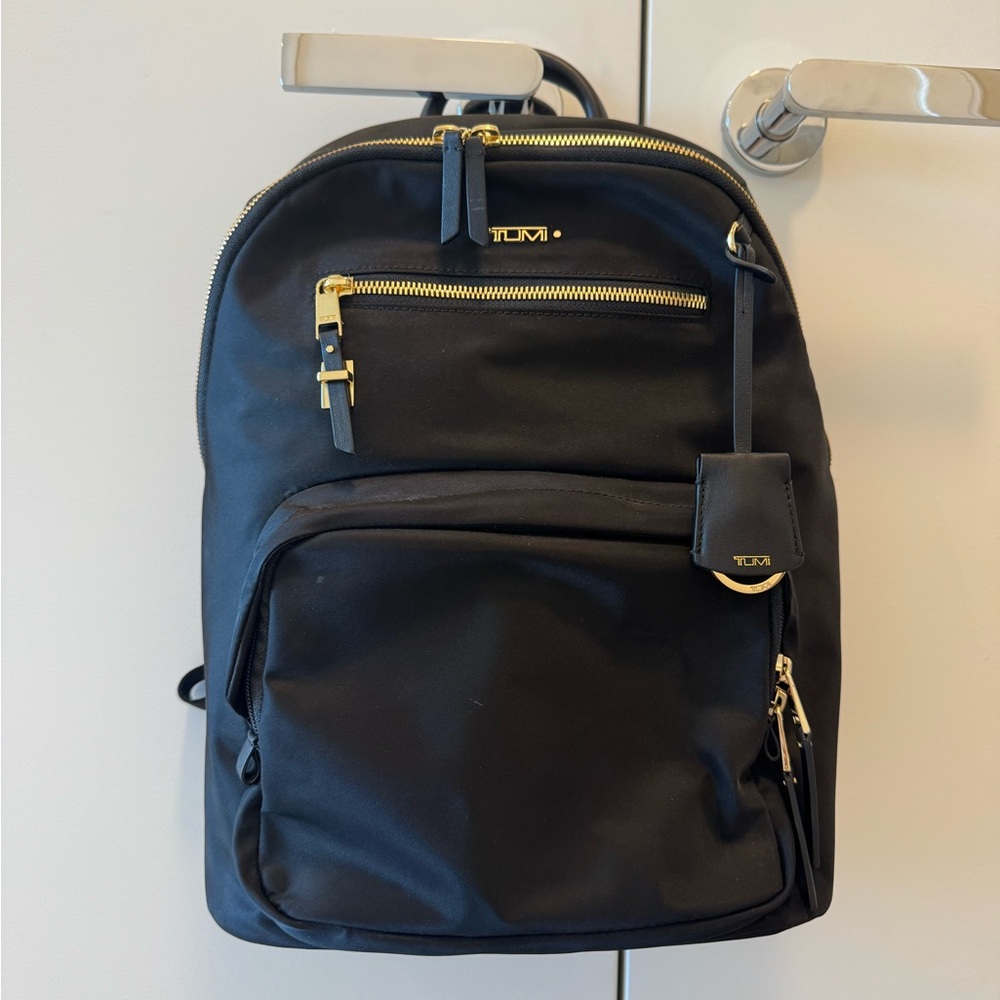 Tumi Black and Gold Women's Backpack